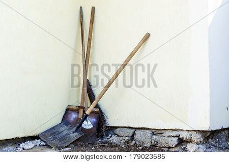 Grunge Wall Background At The Mill, Shovel Near The Wall