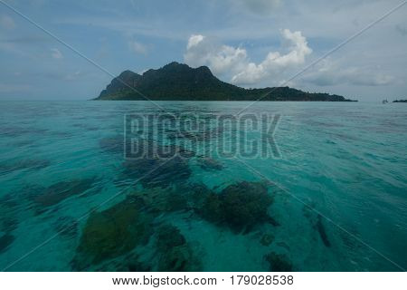 Beautiful tropical Bohey Dulang island with beach and blue water for relax