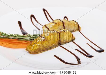 Dishes from sturgeon. Cooked sturgeon. Steak from sturgeon.