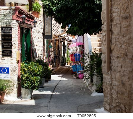 CYPRUS, OMODOS - 17-09-2015: Narrow street in old village Omodos, Cyprus