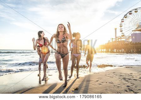 Multi-ethic group of people having fun on the beach
