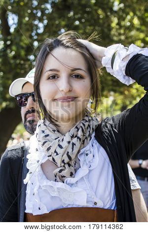 CAGLIARI, ITALY - May 29, 2016: Sunday at La Grande Jatte VIII Ed. At the Public Gardens - portrait of a beautiful girl in Victorian costumes - Sardinia