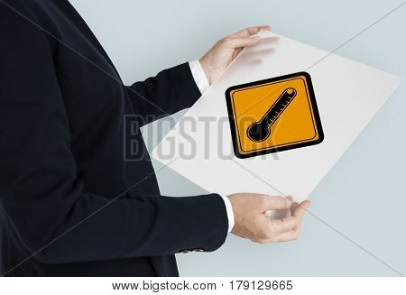 Studio Shoot Holding Banner with Termometer Attention Sign 