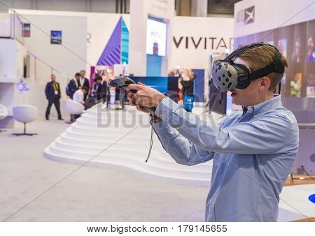 LAS VEGAS - JAN 08 : Virtual reality demonstration at The Vivitar booth at the CES show in Las Vegas on January 08 2017 CES is the world's leading consumer-electronics show.