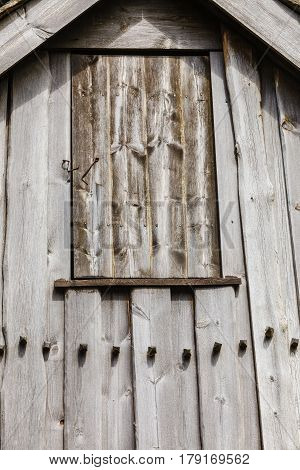 Textures patterns and backgrounds concept. Light old wooden wall detail board closeup
