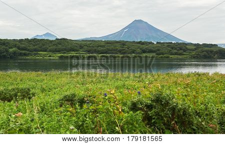 Ilyinsky stratovolcano located in the southern part of Kamchatka Peninsula near Kurile Lake.