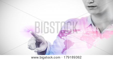 Businesswoman using imaginative digital screen against view of a global map 3d
