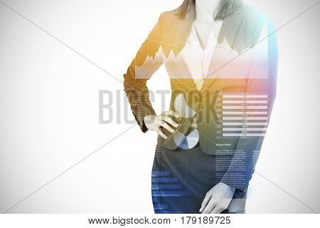 Midsection of businesswoman with hands on hip against business interface with graphs and data 3d