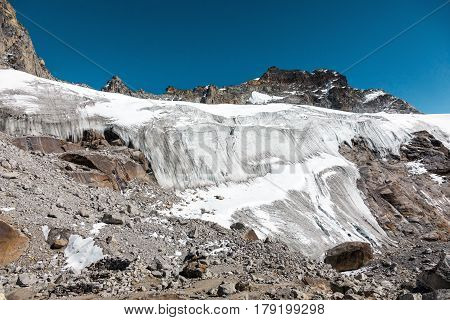 View of Mountain Pass with large severe Glacier and steep Icefall