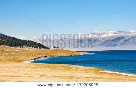 Beautiful Sailimu Lake in Xinjiang, China it's a fault basin at an elevation of 2,073 meters, the highest among the Xinjiang high mountain lakes and with a maximum depth of 86 meters.