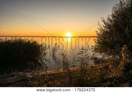 Beautiful Evening Landscape With Lake, Silhouette Tree And Bushes During Sunset.bhopal India