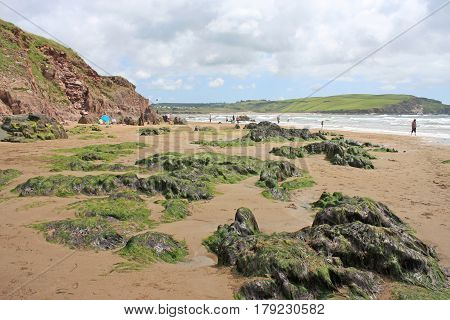 Rocks on Bigbury beach at low tide