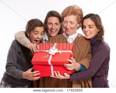 Family women in raptures over an open giftbox