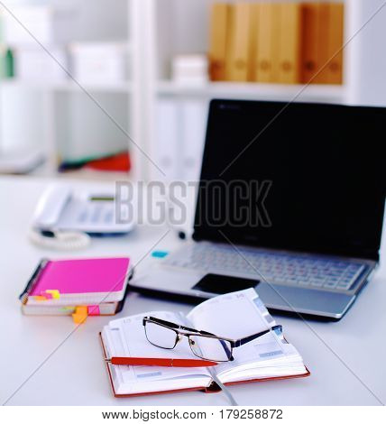 Group Of Multicolored Office Folders And Glasses