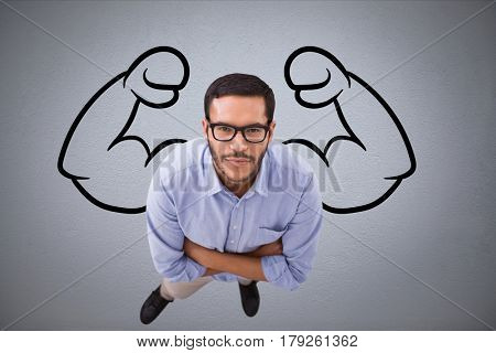 Digital composite of Aerial view of confident business man against grey background with drawing of flexing muscles