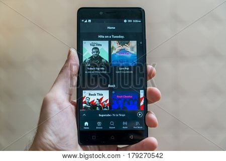 Nitra, Slovakia, March 24, 2017: Spotify application logo on smartphone