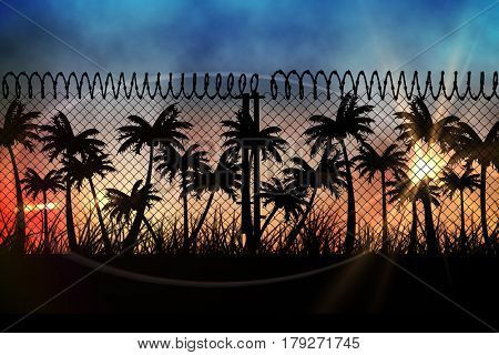 Digital composite of sunset view with palm trees and fence in front