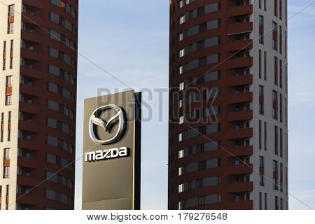 Prague, Czech Republic - March 31: Mazda Car Company Logo In Front Of Dealership Building On March 3