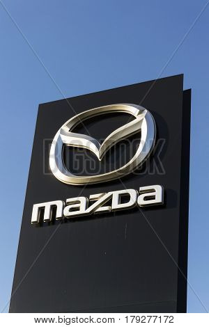 Prague, Czech Republic - March 31: Mazda Car Company Logo In Front Of Dealership Building On March 3