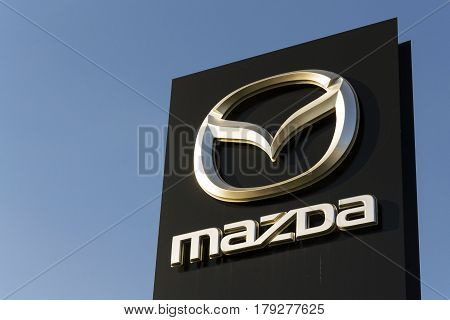Prague, Czech Republic - March 31: Mazda Car Company Logo In Front Of Dealership Building On March 3