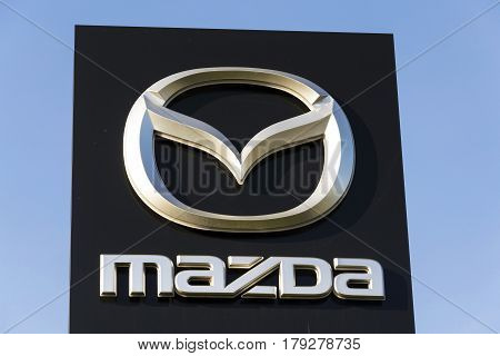 Prague, Czech Republic - March 31: Mazda Car Company Logo In Front Of Dealership Building On March 3