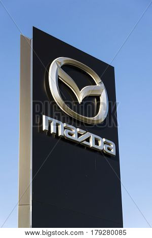 Prague, Czech Republic - March 31: Mazda Car Company Logo In Front Of Dealership Building On March 3