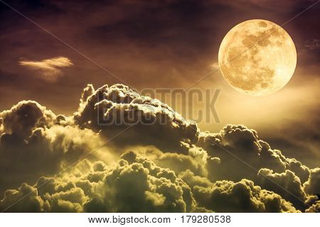 Background night sky with cloudy and bright full moon.  Sepia tone. The moon were NOT furnished by NASA.