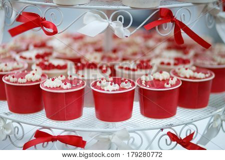 The cute cupcakes on stand for party