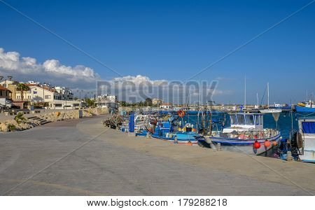 Zygi, Cyprus, view of the marina.  Shows the fishing boats moored on a bright sunny spring day.