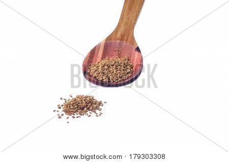 Fenugreek Seeds On A Brass Spoon Isolated On A White Background.