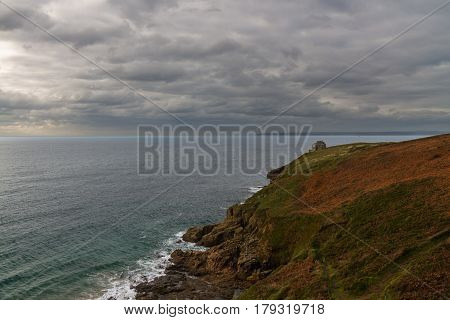 Rinsey Head And Cove With House In Cornwall