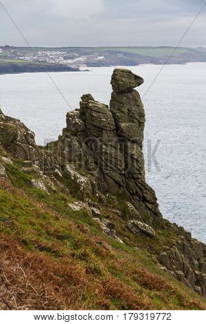 Rock stack on cliffs called The Bishop or The Camel. Rinsey Cornwall England United Kingdom.