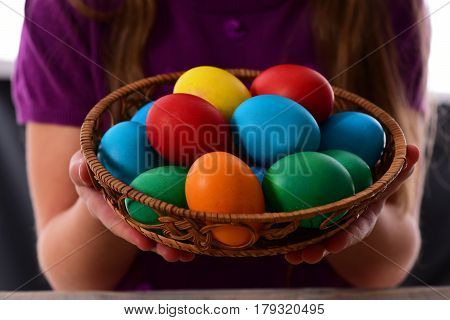 Hands Of Little Small Baby Girl Holding Colorful Handmade Eggs