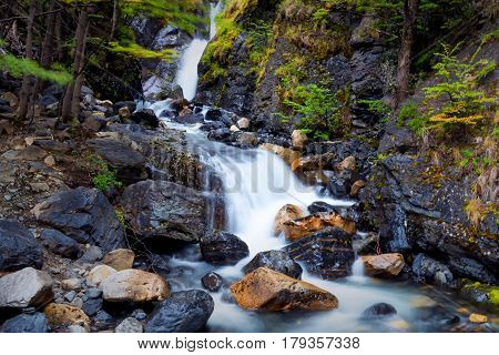 Long exposure of stream waterfalls along hike to  Mirador Torres in Torres del Paine National Park in Chile