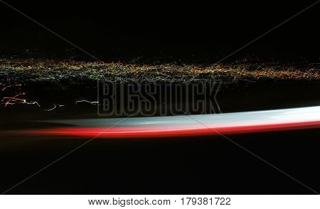 Car lights trace in the street at nigth