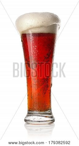 Red beer in a glass isolated on white