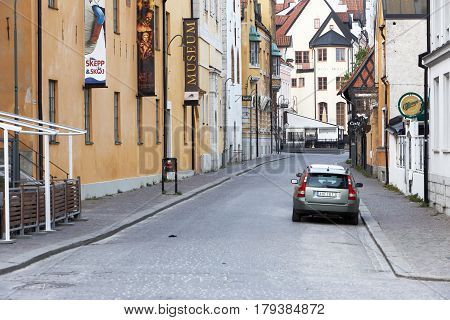 Visby Sweden - May 14 2016: Parked car outside the Gotland museum located at the street addressStrandgatan 14 in Visby.