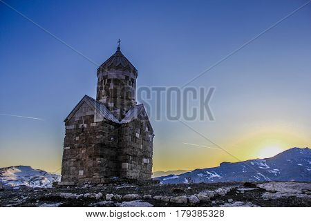 landscape of a historic church in sunset