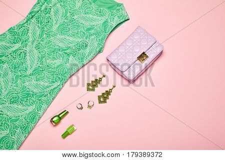 Fashion lady accessories set. Falt Lay. Stylish handbag. Summer dress. Jewelry and nail polish. Women accessories. Trendy fashion design
