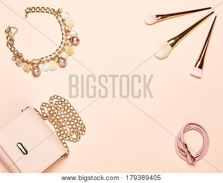 Fashion lady accessories set. Falt Lay. Stylish handbag. Make-Up brushes. Jewelry. Women accessories. Trendy fashion design