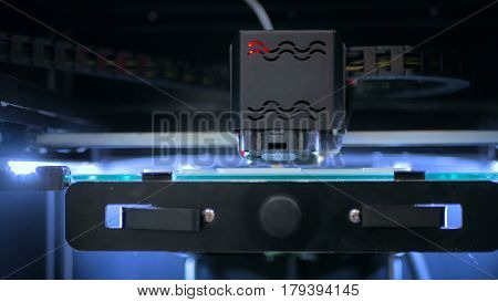 Three dimensional printing machine. 3D printer during work