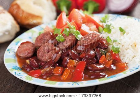 Rice and red kidney beans with sausage slices
