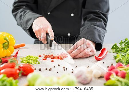 cooking chef chop cut food prepare vegetables women salad cutting chopping mediterranean home kitchen people hand board concept
