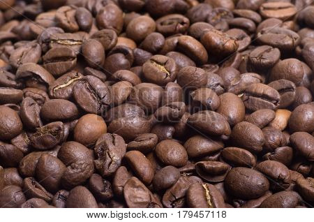 brown roasted coffee beans in bulk close-up