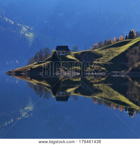 Morning scene at lake Wagital.  Switzerland. Reflection.
