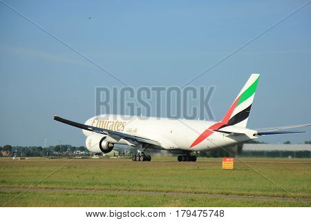 Amsterdam the Netherlands - June 9th 2016: A6-EFJ Emirates Boeing 777-F1H departing from Polderbaan runway Schiphol destination Culumbus Ohio (USA)