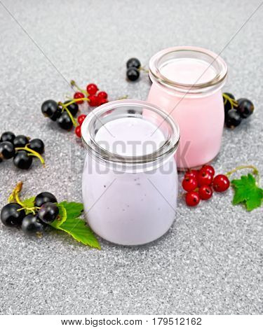 Milk Cocktail With Black And Red Currant On Granite Table