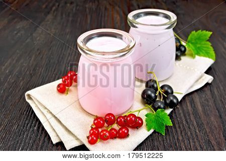 Milk Cocktail With Red And Black Currant On Napkin