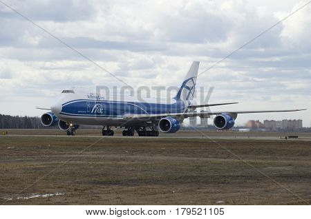 MOSCOW, RUSSIA - APRIL 15, 2015: Boeing 747-8F (onboard VQ-BLQ) airlines Air Bridge Cargo before takeoff. Sheremetyevo
