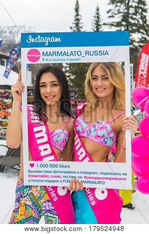 Two Young Happy Pretty Women In Colorful Bikini With Instagram Frame.